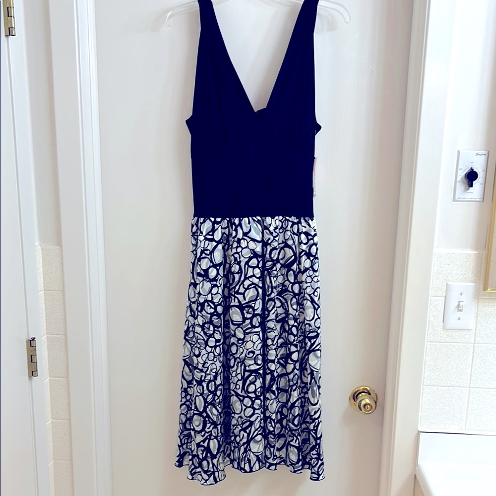 Fun silky black silver and cream cocktail dress w/plunge front neckline, size 12